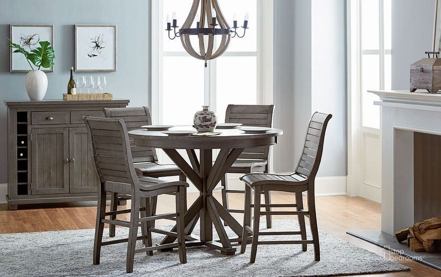 The appearance of Willow Distressed Dark Gray Round Counter Height Dining Room Set designed by Progressive Furniture in the transitional interior design. This gray piece of furniture  was selected by 1StopBedrooms from Willow Collection to add a touch of cosiness and style into your home. Sku: D801-15B;D801-15T;D801-64. Table Top Shape: Round. Material: Wood. Product Type: Dining Room Set. Image1