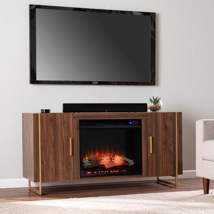 The appearance of Dashton Touch Screen Electric Fireplace With Media Storage designed by SEI Furniture in the modern / contemporary interior design. This brown and gold piece of furniture  was selected by 1StopBedrooms from Dashton Collection to add a touch of cosiness and style into your home. Sku: FR1138156. Material: Wood. Product Type: Fireplace. Image1
