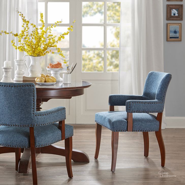 The appearance of Dawson Arm Dining Chair In Blue designed by Olliix in the transitional interior design. This blue piece of furniture  was selected by 1StopBedrooms from Dawson Collection to add a touch of cosiness and style into your home. Sku: MP100-0042. Material: Wood. Product Type: Dining Chair. Image1