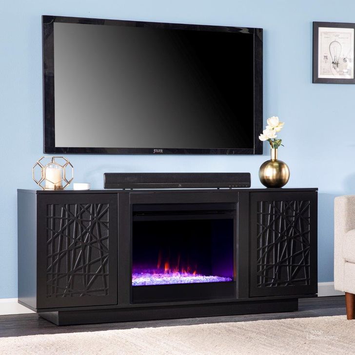The appearance of Delgrave Color Changing Fireplace With Media Storage In Black designed by SEI Furniture in the modern / contemporary interior design. This black piece of furniture  was selected by 1StopBedrooms from Delgrave Collection to add a touch of cosiness and style into your home. Sku: FC1224756. Material: Wood. Product Type: Fireplace. Image1