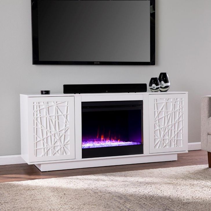 The appearance of Delgrave Color Changing Fireplace With Media Storage designed by SEI Furniture in the modern / contemporary interior design. This white piece of furniture  was selected by 1StopBedrooms from Delgrave Collection to add a touch of cosiness and style into your home. Sku: FC1095656. Material: Wood. Product Type: Fireplace. Image1