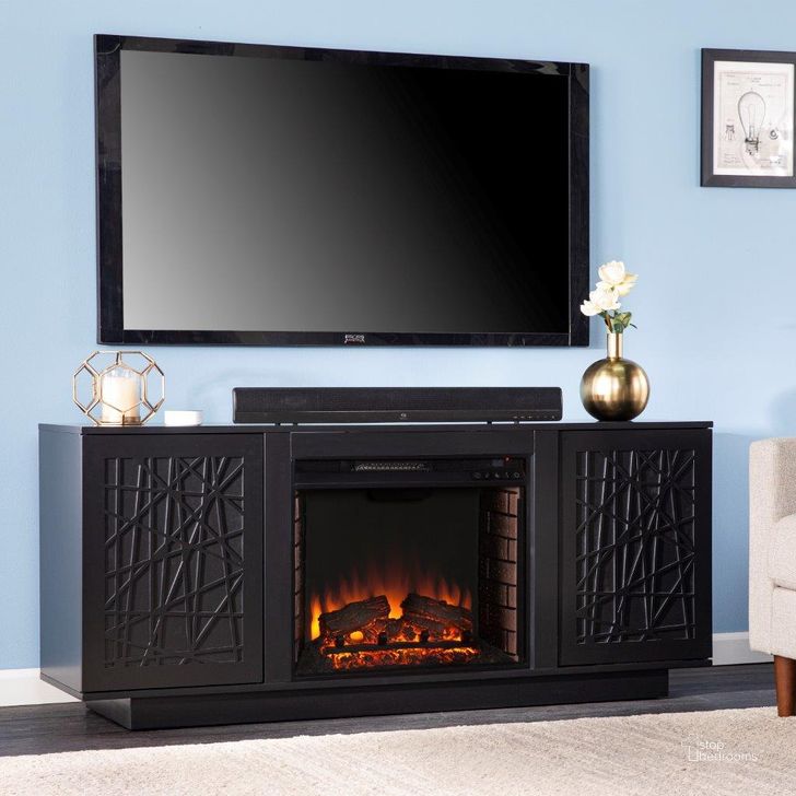 The appearance of Delgrave Electric Media Fireplace With Storage In Black designed by SEI Furniture in the modern / contemporary interior design. This black piece of furniture  was selected by 1StopBedrooms from Delgrave Collection to add a touch of cosiness and style into your home. Sku: FE1224756. Material: Wood. Product Type: Fireplace. Image1