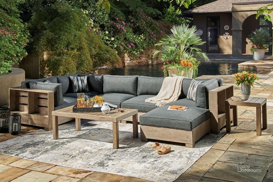 The appearance of Delton Brown/Charcoal Outdoor Sectional Outdoor Conversation Set 0qd24401035 designed by Bennett Interiors in the transitional interior design. This brown piece of furniture  was selected by 1StopBedrooms from Delton Collection to add a touch of cosiness and style into your home. Sku: P660-875;P660-877;P660-846;P660-876. Material: Wood. Product Type: Outdoor Sectional. Image1