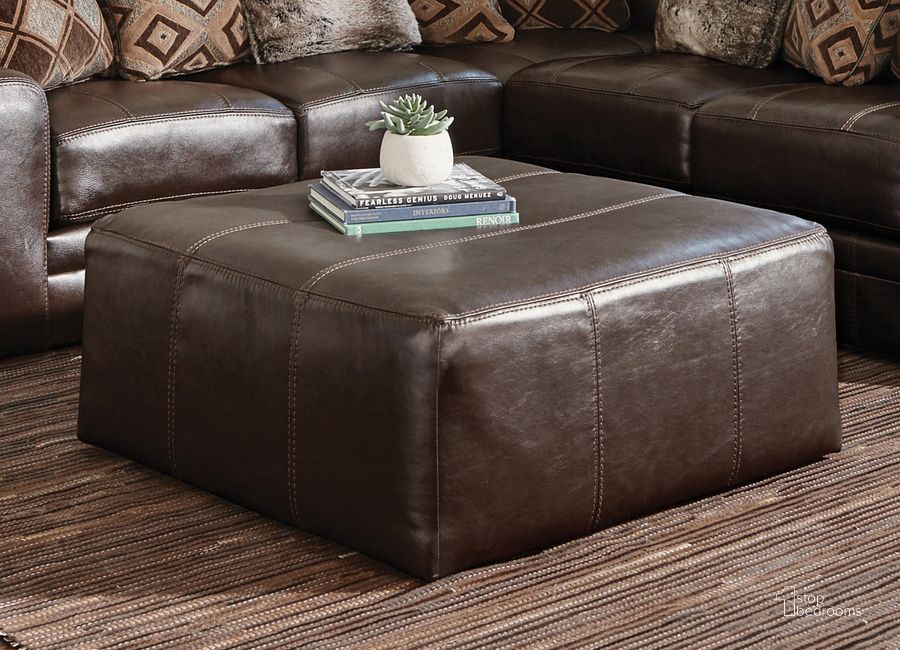 The appearance of Denali 40 Inch Leather Match Cocktail Ottoman In Chocolate designed by Jackson in the traditional interior design. This chocolate piece of furniture  was selected by 1StopBedrooms from Denali Collection to add a touch of cosiness and style into your home. Sku: 4378121283930839. Product Type: Ottoman. Material: Leather Match.