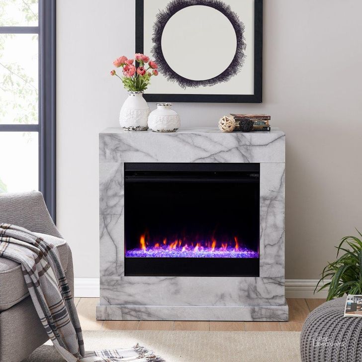 The appearance of Dendale Faux Marble Fireplace In White FC1062859 designed by SEI Furniture in the modern / contemporary interior design. This white piece of furniture  was selected by 1StopBedrooms from Dendale Collection to add a touch of cosiness and style into your home. Sku: FC1062859. Material: Wood. Product Type: Fireplace. Image1