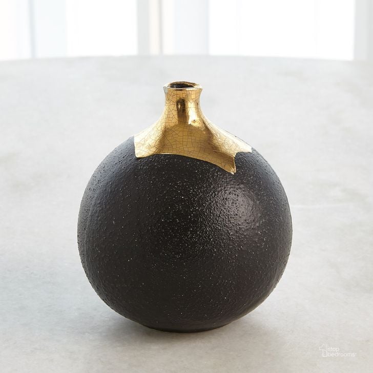 The appearance of Dipped Golden Crackle And Black Sphere Small Vase In Black designed by Global Views in the modern / contemporary interior design. This black piece of furniture  was selected by 1StopBedrooms from Dipped Collection to add a touch of cosiness and style into your home. Sku: 3.31643. Material: Ceramic. Product Type: Vase. Image1