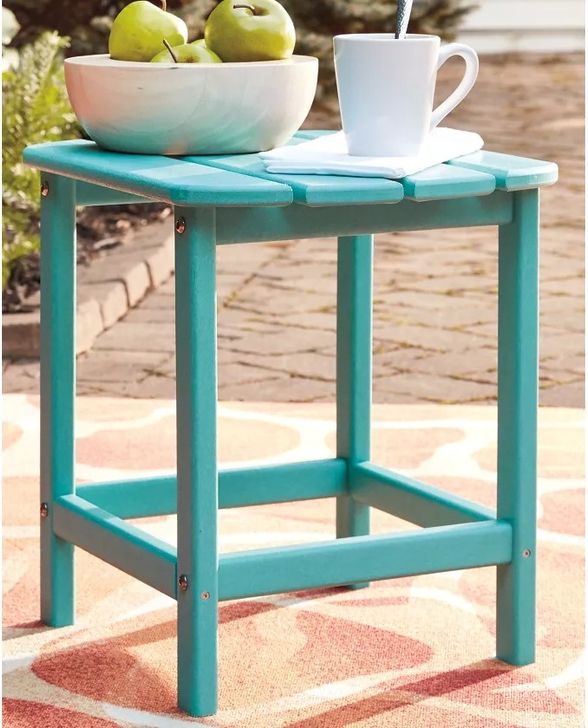 The appearance of Dragosvale Turquoise Outdoor Table designed by Boho House in the modern / contemporary interior design. This turquoise piece of furniture  was selected by 1StopBedrooms from Dragosvale Collection to add a touch of cosiness and style into your home. Sku: P012-703. Material: Wood. Product Type: Outdoor Table. Image1