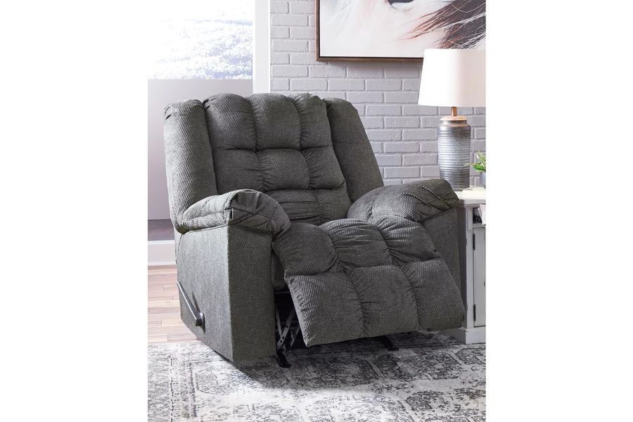 The appearance of Drakestone Charcoal Rocker Recliner designed by Signature Design by Ashley in the modern / contemporary interior design. This charcoal piece of furniture  was selected by 1StopBedrooms from Drakestone Collection to add a touch of cosiness and style into your home. Sku: 3540225. Material: Fabric. Product Type: Rocker Recliner. Image1