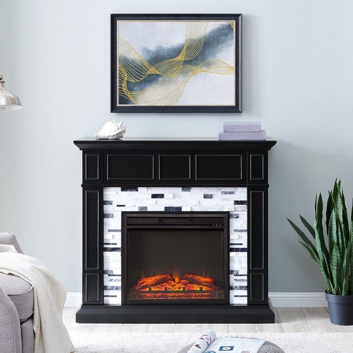 The appearance of Drovling Marble Base Electric Fireplace designed by SEI Furniture in the modern / contemporary interior design. This black piece of furniture  was selected by 1StopBedrooms from Drovling Collection to add a touch of cosiness and style into your home. Sku: FP1080859. Material: Wood. Product Type: Fireplace. Image1
