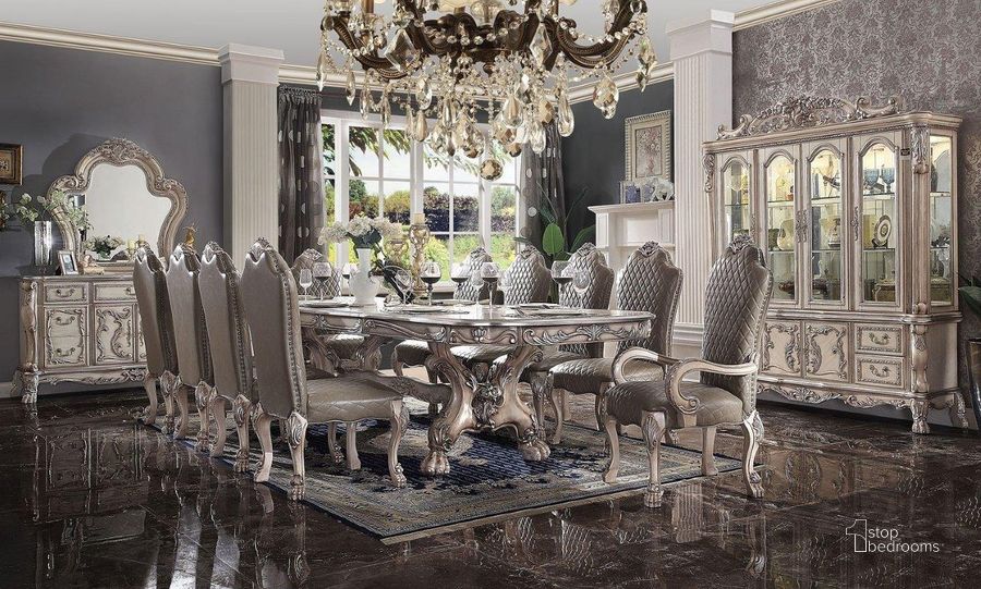 The appearance of Drummondville Bone White Dining Room Set 0qb24544894 designed by Isaac Tahari in the transitional interior design. This bone white piece of furniture  was selected by 1StopBedrooms from Drummondville Collection to add a touch of cosiness and style into your home. Sku: 68170T;68171ST;68172. Table Base Style: Trestle. Material: Wood. Product Type: Dining Room Set. Table Top Shape: Rectangular. Size: 136". Image1