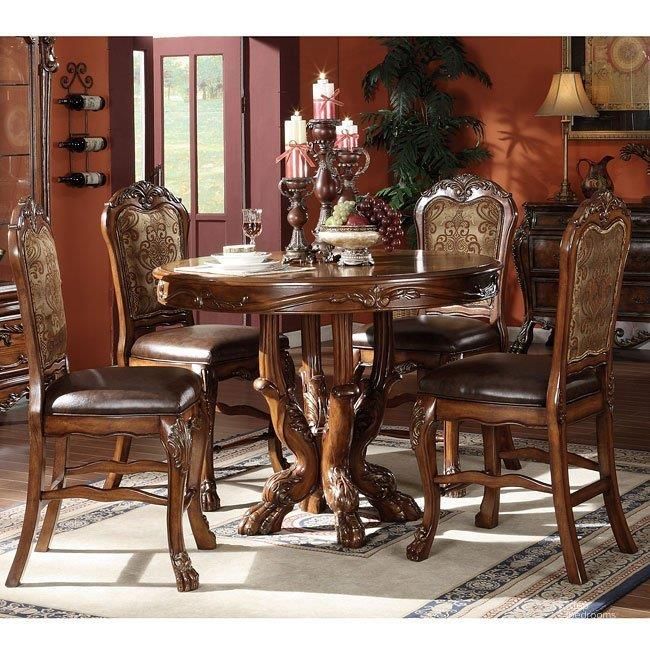The appearance of Drummondville Cherry Dining Room Set 0qb022884 designed by Isaac Tahari in the transitional interior design. This cherry piece of furniture  was selected by 1StopBedrooms from Drummondville Collection to add a touch of cosiness and style into your home. Sku: 12160T;12161ST;12162. Table Top Shape: Round. Material: Wood. Product Type: Dining Room Set. Table Top Style: Pedestal. Size: 48". Image1