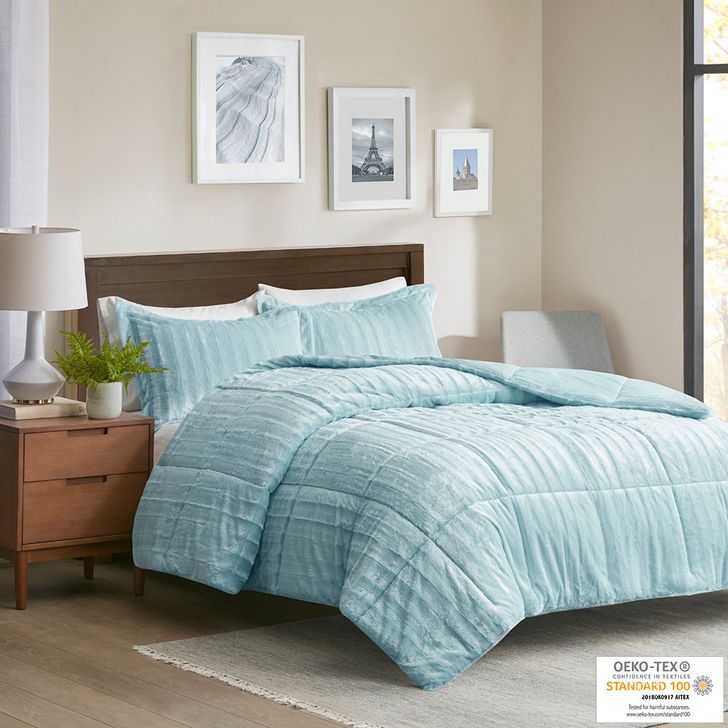 The appearance of Duke Polyester Faux Fur Queen Comforter Mini Set In Aqua designed by Olliix in the glam interior design. This aqua piece of furniture  was selected by 1StopBedrooms from Duke Collection to add a touch of cosiness and style into your home. Sku: MP10-7632. Material: Polyester. Bed Size: Queen. Product Type: Comforter Set. Image1