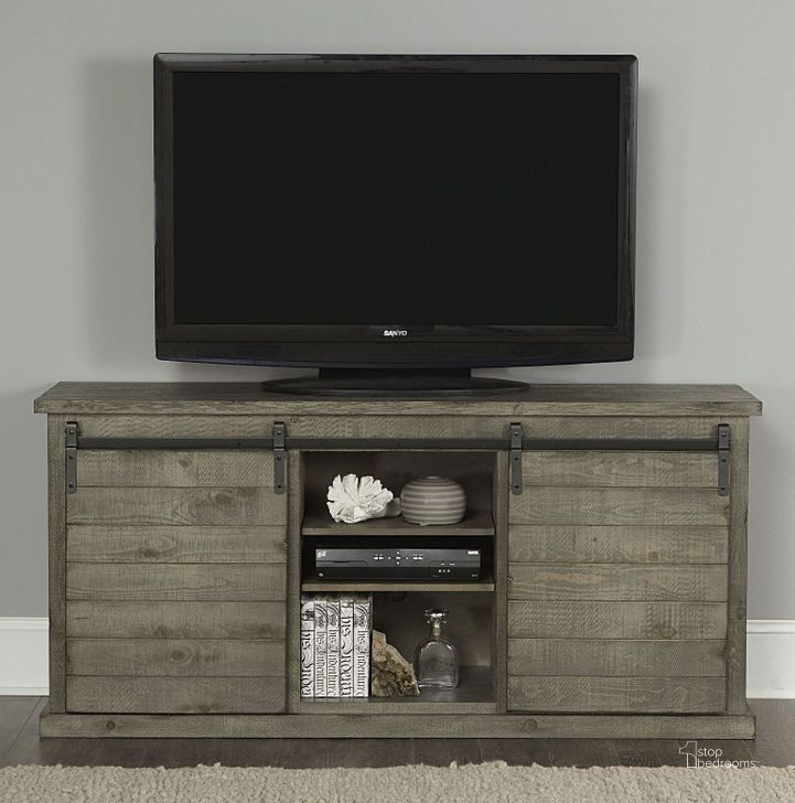 The appearance of Huntington Distressed Gray 64 Console designed by Progressive Furniture in the transitional interior design. This gray piece of furniture  was selected by 1StopBedrooms from Huntington Collection to add a touch of cosiness and style into your home. Sku: E762-64G. Product Type: TV Console. Material: Pine.