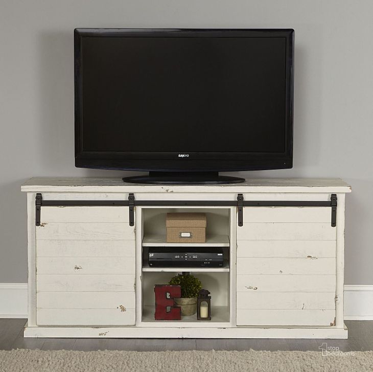 The appearance of Huntington Distressed White 64 Console designed by Progressive Furniture in the transitional interior design. This white piece of furniture  was selected by 1StopBedrooms from Huntington Collection to add a touch of cosiness and style into your home. Sku: E762-64W. Product Type: TV Console. Material: Pine.