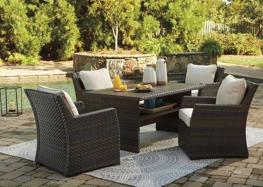 The appearance of Easy Isle Dark Brown and Beige Outdoor Rectangular Dining Room Set designed by Signature Design by Ashley in the transitional interior design. This beige and dark brown piece of furniture  was selected by 1StopBedrooms from Easy Isle Collection to add a touch of cosiness and style into your home. Sku: P455-625;P455-820. Table Top Shape: Rectangular. Product Type: Outdoor Dining Set. Image1