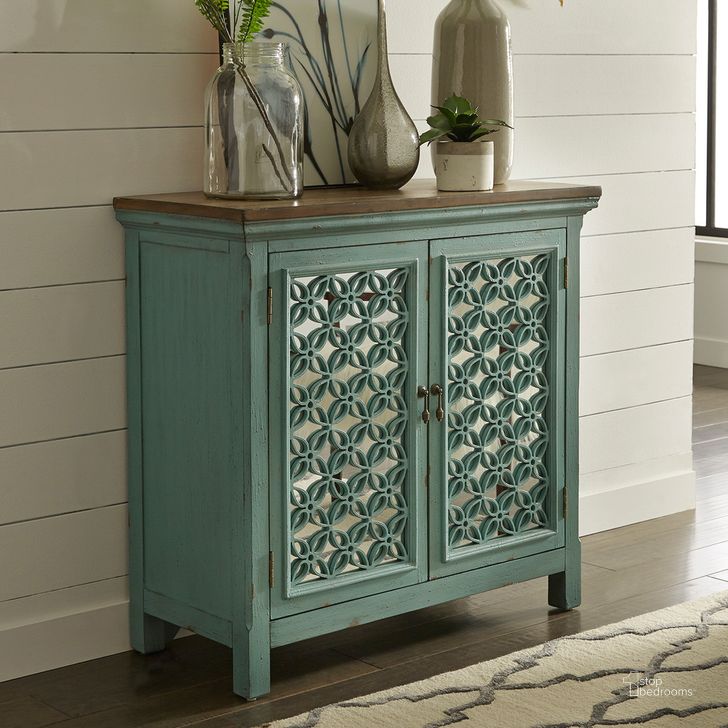 The appearance of Eclectic Living Turquoise 2 Door Accent Cabinet designed by Liberty in the transitional interior design. This blue piece of furniture  was selected by 1StopBedrooms from Eclectic Living Accents Collection to add a touch of cosiness and style into your home. Sku: 2011-AC3836. Material: Wood. Product Type: Accent Cabinet. Image1