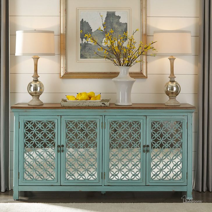 The appearance of Eclectic Living Turquoise 4 Door Accent Cabinet designed by Liberty in the transitional interior design. This blue piece of furniture  was selected by 1StopBedrooms from Eclectic Living Accents Collection to add a touch of cosiness and style into your home. Sku: 2011-AC7236. Material: Wood. Product Type: Accent Cabinet. Image1