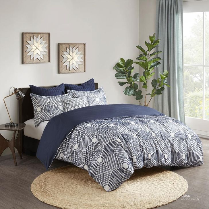 The appearance of Ellipse Cotton Clipped Jacquard Queen Comforter Set In Navy designed by Olliix in the modern / contemporary interior design. This navy piece of furniture  was selected by 1StopBedrooms from Ellipse Collection to add a touch of cosiness and style into your home. Sku: II10-1069. Material: Polyester. Bed Size: Queen. Product Type: Comforter Set. Image1