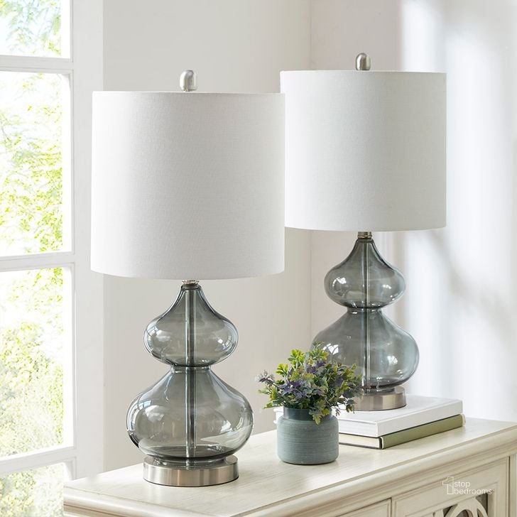The appearance of Ellipse Table Lamp Set Of 2 In Gray designed by Olliix in the transitional interior design. This gray piece of furniture  was selected by 1StopBedrooms from Ellipse Collection to add a touch of cosiness and style into your home. Sku: 5DS153-0019. Material: Polyester. Product Type: Table Lamp. Image1