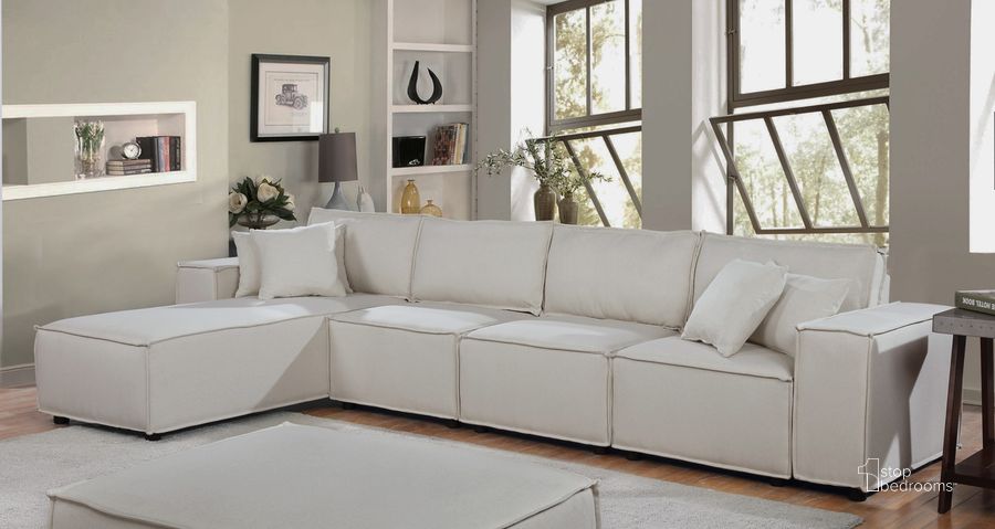 The appearance of Ermont Sofa With Reversible Chaise In Beige Linen designed by Lilola Home in the modern / contemporary interior design. This beige piece of furniture  was selected by 1StopBedrooms from Ermont Collection to add a touch of cosiness and style into your home. Sku: 89116-5. Material: Wood. Product Type: Sofa. Image1