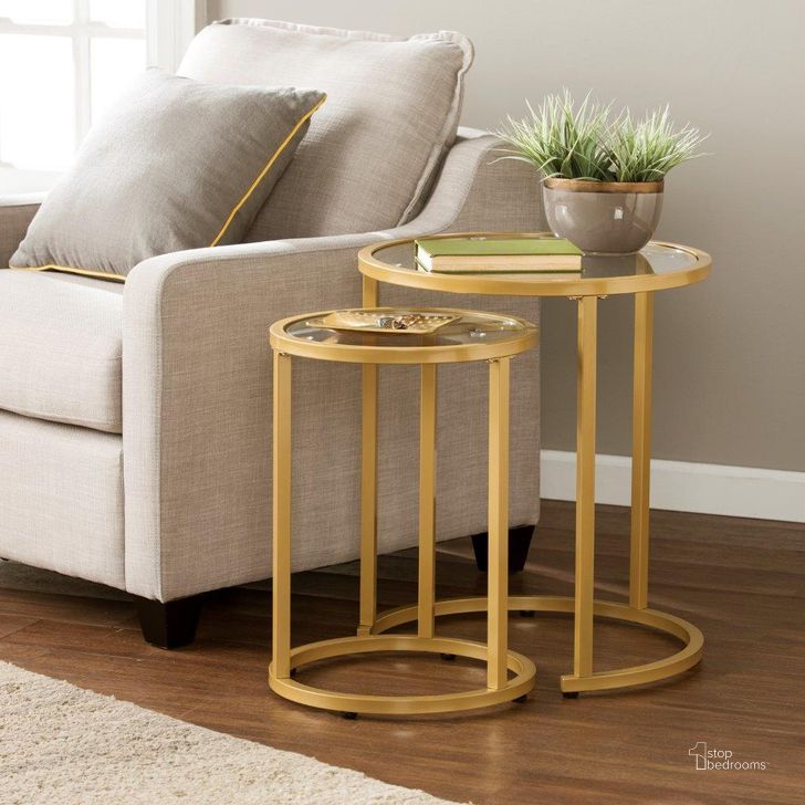 The appearance of Evelyn Glam Nesting Side Table 2Pc Set In Gold designed by SEI Furniture in the transitional interior design. This gold piece of furniture  was selected by 1StopBedrooms from Evelyn Collection to add a touch of cosiness and style into your home. Sku: CK4292. Material: Glass. Product Type: Side Table. Image1