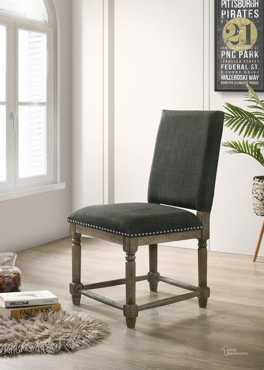 The appearance of Everton Gray Fabric Dining Chair With Nailhead Trim Set of 2 designed by Lilola Home in the country / farmhouse interior design. This gray piece of furniture  was selected by 1StopBedrooms from Everton Collection to add a touch of cosiness and style into your home. Sku: 30518. Material: Fabric. Product Type: Dining Chair. Image1