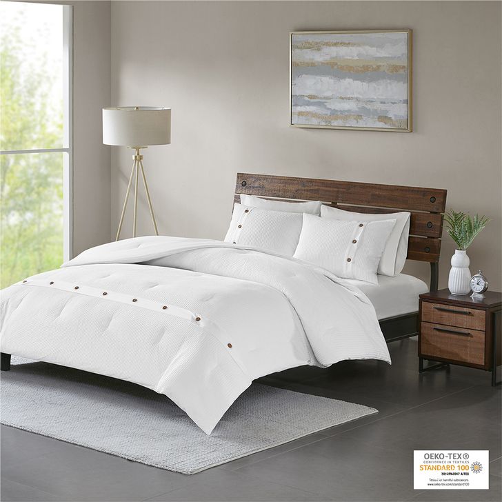 The appearance of Finley Cotton Waffle Weave King Comforter Set In White designed by Olliix in the country / farmhouse interior design. This white piece of furniture  was selected by 1StopBedrooms from Finley Collection to add a touch of cosiness and style into your home. Sku: MP10-5625. Material: Polyester. Bed Size: King. Product Type: Comforter Set. Image1