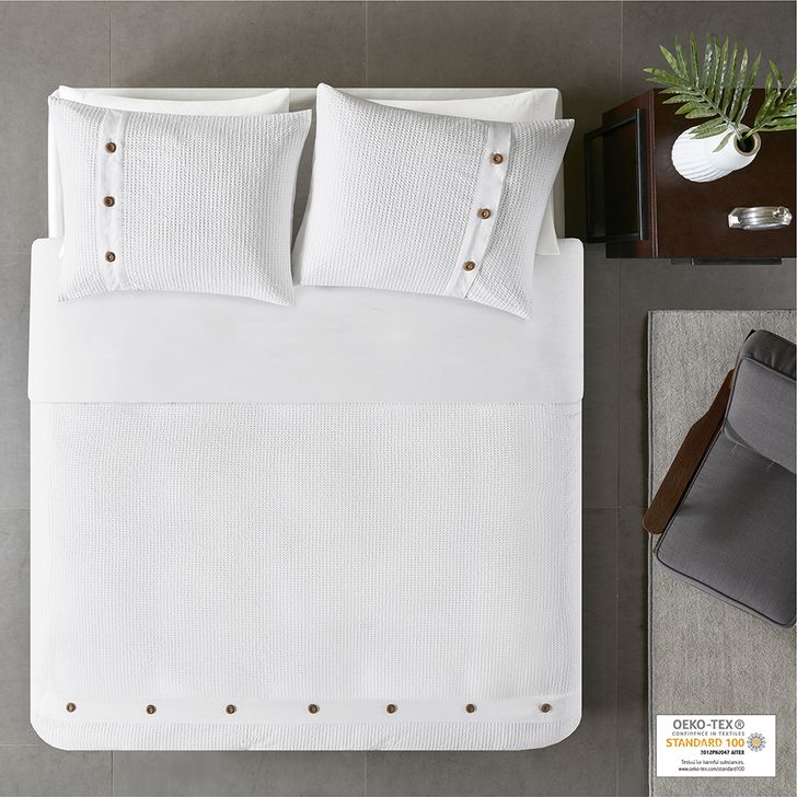The appearance of Finley Cotton Waffle Weave Queen Duvet Cover Set In White designed by Olliix in the country / farmhouse interior design. This white piece of furniture  was selected by 1StopBedrooms from Finley Collection to add a touch of cosiness and style into your home. Sku: MP12-5626. Bed Size: Queen. Material: Cotton. Product Type: Duvet Cover Set. Image1