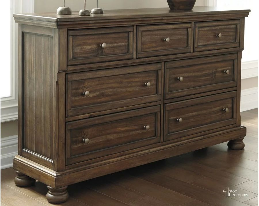 The appearance of Flynnter Porter Medium Brown Dresser designed by Signature Design by Ashley in the transitional interior design. This medium brown piece of furniture  was selected by 1StopBedrooms from Flynnter Porter Collection to add a touch of cosiness and style into your home. Sku: B719-31. Material: Wood. Product Type: Dresser. Image1