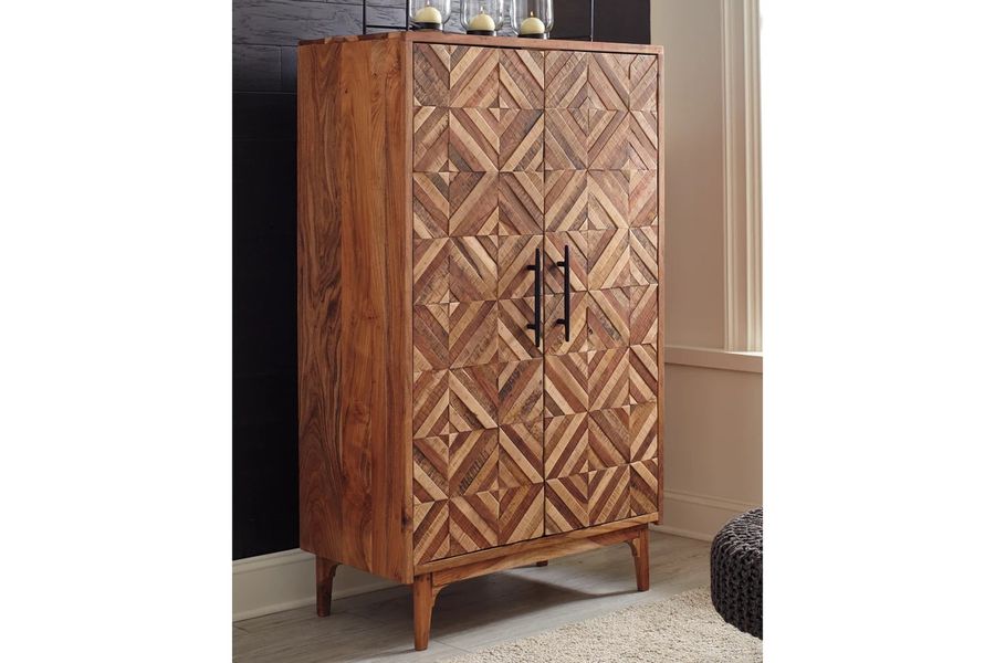 The appearance of Gabinwell Two Tone Brown Accent Cabinet designed by Signature Design by Ashley in the traditional interior design. This two-tone brown piece of furniture  was selected by 1StopBedrooms from Gabinwell Collection to add a touch of cosiness and style into your home. Sku: A4000267. Material: Wood. Product Type: Accent Chest. Image1