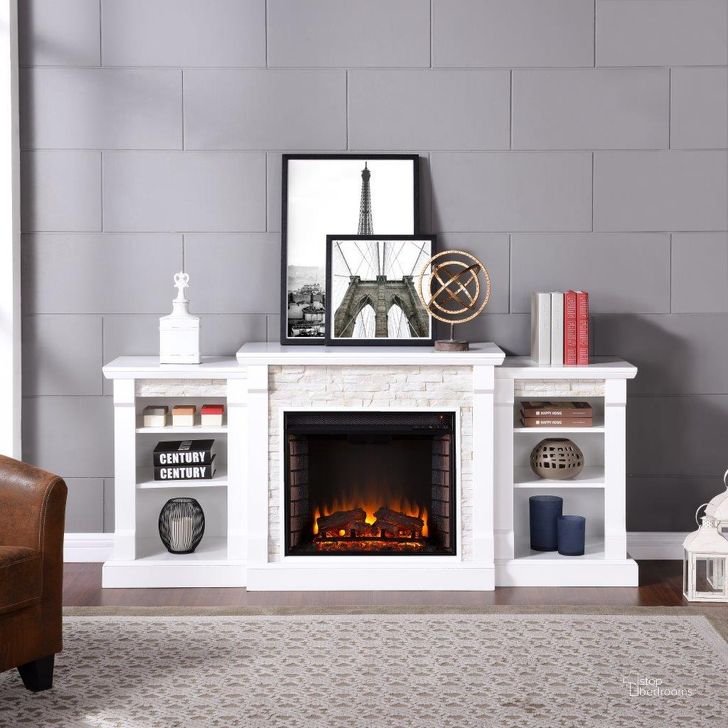 The appearance of Gallatin Electric Fireplace With Bookcases In White With White Faux Stone designed by SEI Furniture in the traditional interior design. This white piece of furniture  was selected by 1StopBedrooms from Gallatin Collection to add a touch of cosiness and style into your home. Sku: FE8526. Material: Wood. Product Type: Fireplace. Image1
