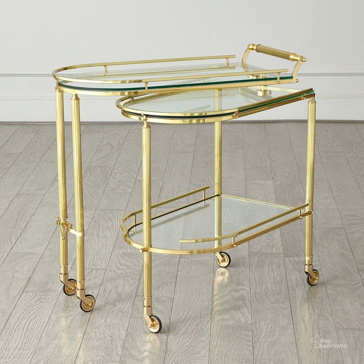 The appearance of Gallery Folding Bar In Shiny Brass designed by Global Views in the modern / contemporary interior design. This gold piece of furniture  was selected by 1StopBedrooms from Gallery Collection to add a touch of cosiness and style into your home. Sku: 9.93555. Product Type: Bar Cart. Material: Brass. Image1