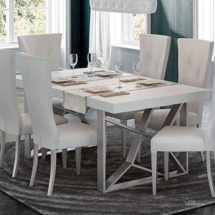The appearance of Glamorgan White High Gloss Dining Table designed by Atelier Home in the modern / contemporary interior design. This white high gloss piece of furniture  was selected by 1StopBedrooms from Glamorgan Collection to add a touch of cosiness and style into your home. Sku: KIUDININGTABLE. Table Base Style: Double Pedestal. Product Type: Dining Table. Material: MDF. Table Top Shape: Rectangular. Size: 79.