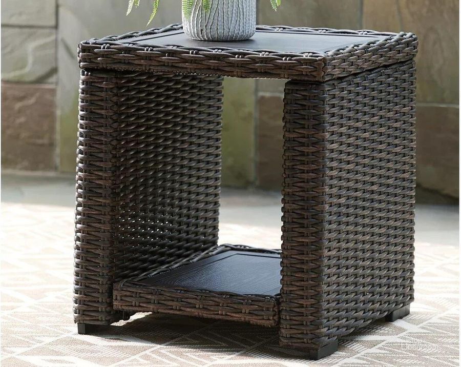 The appearance of Grasson Lane Brown Outdoor Square End Table designed by Signature Design by Ashley in the transitional interior design. This brown piece of furniture  was selected by 1StopBedrooms from Grasson Lane Collection to add a touch of cosiness and style into your home. Sku: P783-702. Material: Metal. Product Type: Outdoor Table. Image1