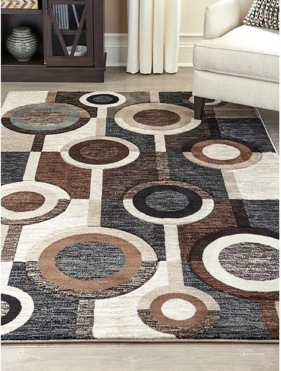 The appearance of Guintte Black And Brown Large Rug designed by Signature Design by Ashley in the modern / contemporary interior design. This multi piece of furniture  was selected by 1StopBedrooms from Guintte Collection to add a touch of cosiness and style into your home. Sku: R403971. Material: Fabric. Product Type: Rug. Image1