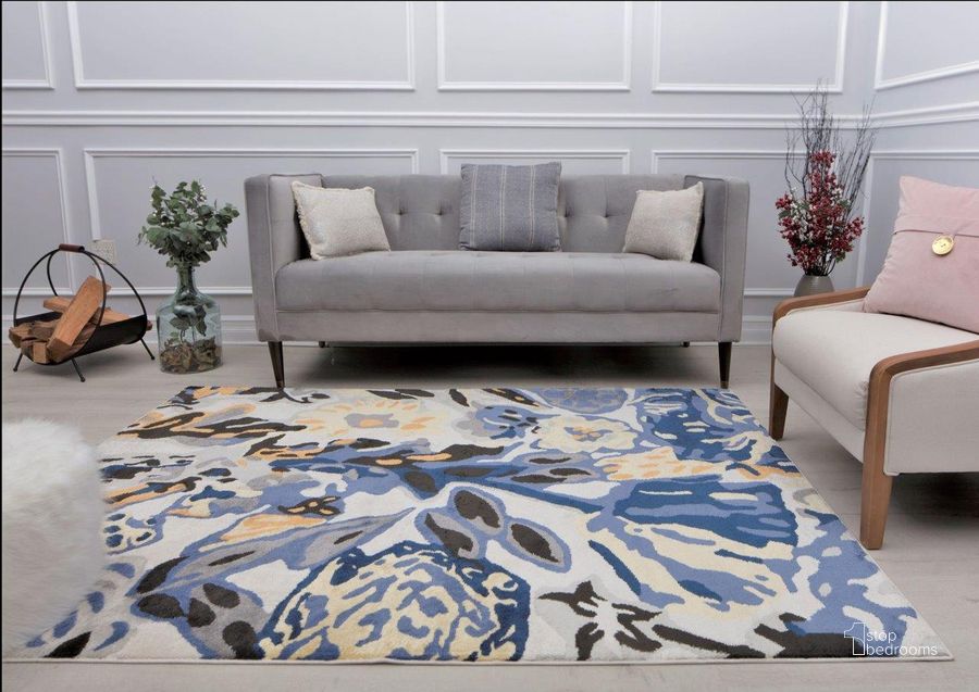 The appearance of Hanna VA15C Spring Delight Floral Transitional Blue 8' x 10' Area Rug designed by Rugs America in the transitional interior design. This blue piece of furniture  was selected by 1StopBedrooms from Hanna Collection to add a touch of cosiness and style into your home. Sku: RA28475. Material: Polypropylene. Product Type: Area Rugs. Image1