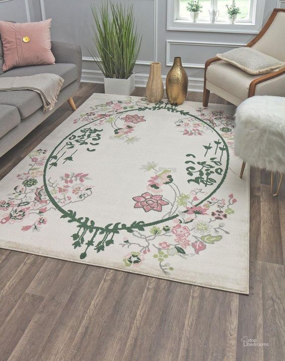 The appearance of Hanna VA20A Cream Magnolia Floral Transitional Beige 8' x 10' Area Rug designed by Rugs America in the transitional interior design. This beige piece of furniture  was selected by 1StopBedrooms from Hanna Collection to add a touch of cosiness and style into your home. Sku: RA28478. Material: Polypropylene. Product Type: Area Rugs. Image1