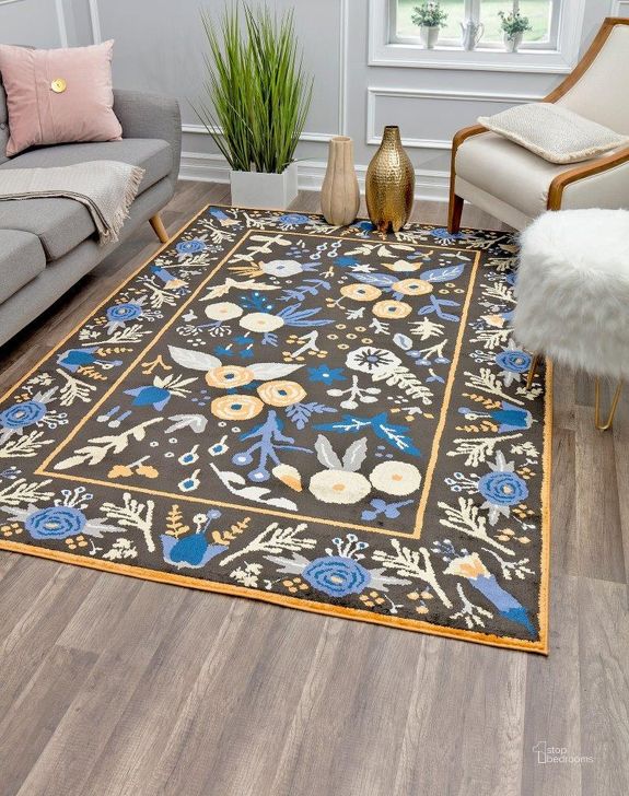 The appearance of Hanna VA30B Gardenia Golden Night Floral Transitional Black 8' x 10' Area Rug designed by Rugs America in the transitional interior design. This black piece of furniture  was selected by 1StopBedrooms from Hanna Collection to add a touch of cosiness and style into your home. Sku: RA28496. Material: Polypropylene. Product Type: Area Rugs. Image1