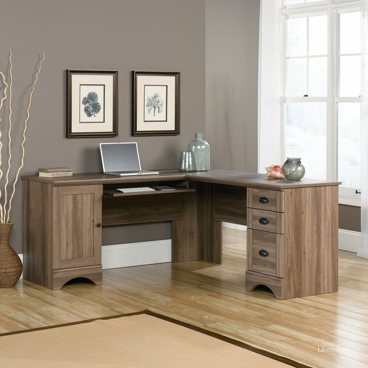 The appearance of Harbor View Corner Computer Desk In Salt Oak designed by Sauder in the country / farmhouse interior design. This salt oak piece of furniture  was selected by 1StopBedrooms from Harbor View Collection to add a touch of cosiness and style into your home. Sku: 417586. Product Type: Computer Desk. Material: Engineered Wood. Image1