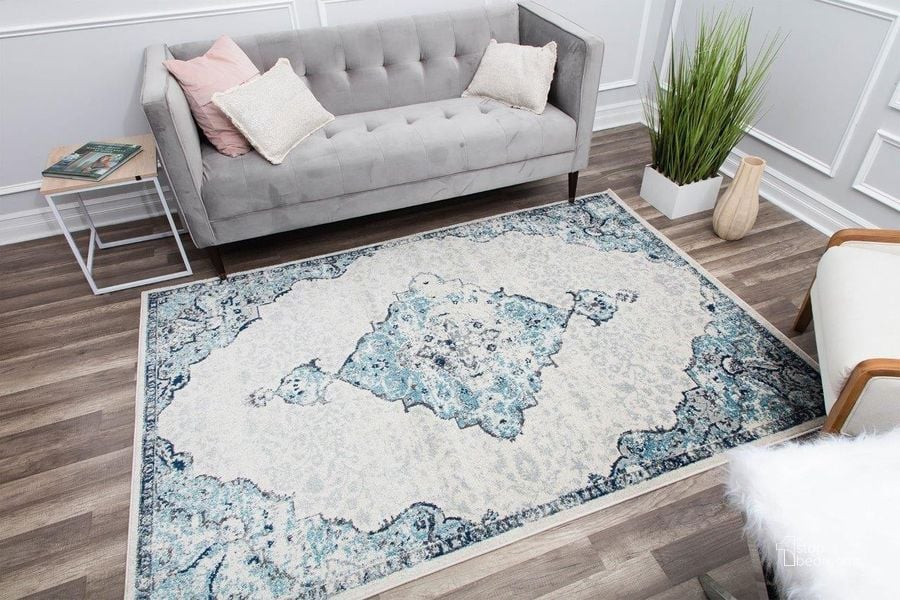 The appearance of Harper HY50G Bluebonnet Transitional Vintage 5' x 7' Area Rug designed by Rugs America in the transitional interior design. This blue piece of furniture  was selected by 1StopBedrooms from Harper Collection to add a touch of cosiness and style into your home. Sku: RA29375. Material: Polypropylene. Product Type: Area Rugs. Image1