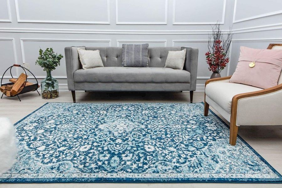 The appearance of Harper HY50N Mozart Blue Abstract Vintage Blue 5' x 7' Area Rug designed by Rugs America in the rustic / southwestern interior design. This blue piece of furniture  was selected by 1StopBedrooms from Harper Collection to add a touch of cosiness and style into your home. Sku: RA30935. Material: Polypropylene. Product Type: Area Rugs. Image1