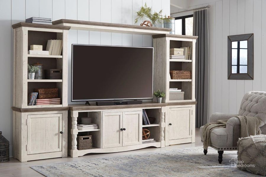 The appearance of Havalance Weathered Gray And Vintage White 4 Piece Entertainment Center designed by Signature Design by Ashley in the transitional interior design. This two-tone piece of furniture  was selected by 1StopBedrooms from Havalance Collection to add a touch of cosiness and style into your home. Sku: W814-30;W814-33;W814-34;W814-35. Material: Wood. Product Type: Entertainment Center. Image1
