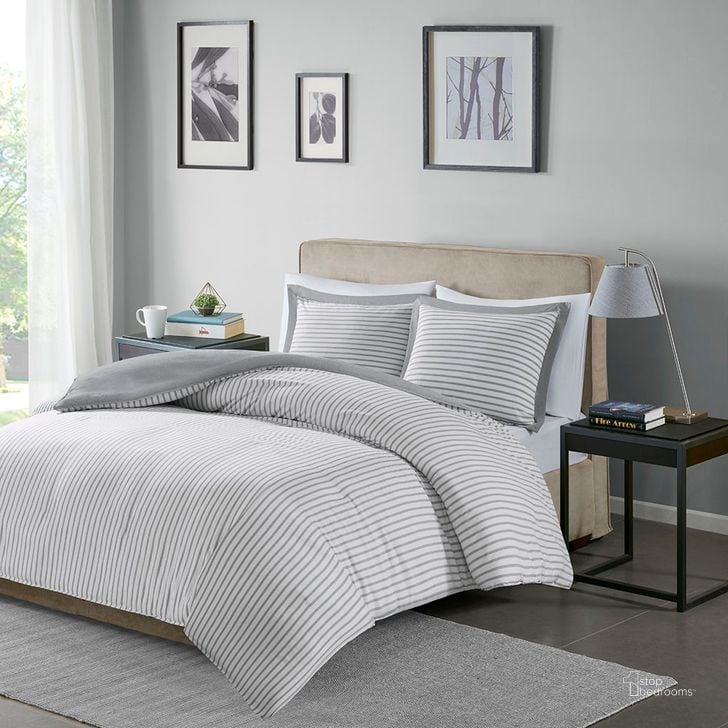 The appearance of Hayden Polyester Microfiber Reversible Striped King Duvet Cover Mini Set In Grey designed by Olliix in the transitional interior design. This grey piece of furniture  was selected by 1StopBedrooms from Hayden Collection to add a touch of cosiness and style into your home. Sku: MPE12-644. Material: Microfiber. Bed Size: King. Product Type: Duvet Cover Set. Image1