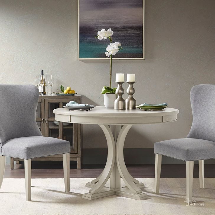 The appearance of Helena Round Dining Table In Antique Cream designed by Olliix in the traditional interior design. This antique cream piece of furniture  was selected by 1StopBedrooms from Helena Collection to add a touch of cosiness and style into your home. Sku: MPS121-0295. Table Base Style: Trestle. Table Top Shape: Round. Product Type: Dining Table. Material: MDF. Size: 44". Image1