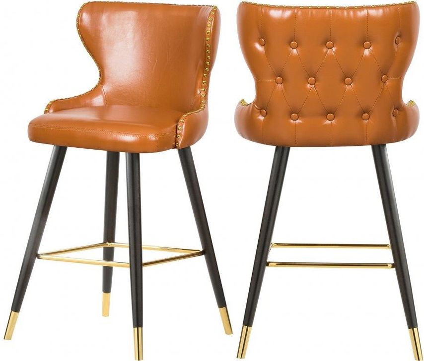 The appearance of Hendrix Cognac Faux Leather Counter/Bar Stool Set of 2 designed by Meridian in the modern / contemporary interior design. This cognac piece of furniture  was selected by 1StopBedrooms from Hendrix Collection to add a touch of cosiness and style into your home. Sku: 962Cognac-C. Material: Faux Leather. Product Type: Barstool. Image1