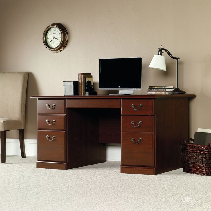 The appearance of Heritage Hill Computer Desk In Classic Cherry designed by Sauder in the traditional interior design. This classic cherry piece of furniture  was selected by 1StopBedrooms from Heritage Hill Collection to add a touch of cosiness and style into your home. Sku: 109830. Product Type: Computer Desk. Material: Engineered Wood. Image1