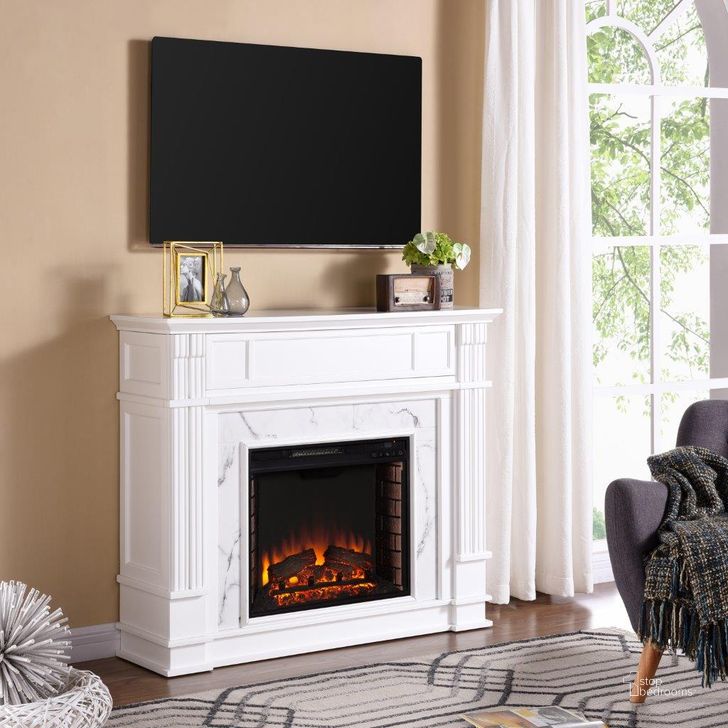 The appearance of Highgate Faux Cararra Marble Electric Media Fireplace In White designed by SEI Furniture in the transitional interior design. This white piece of furniture  was selected by 1StopBedrooms from Highgate Collection to add a touch of cosiness and style into your home. Sku: FE9322. Material: Wood. Product Type: Fireplace. Image1
