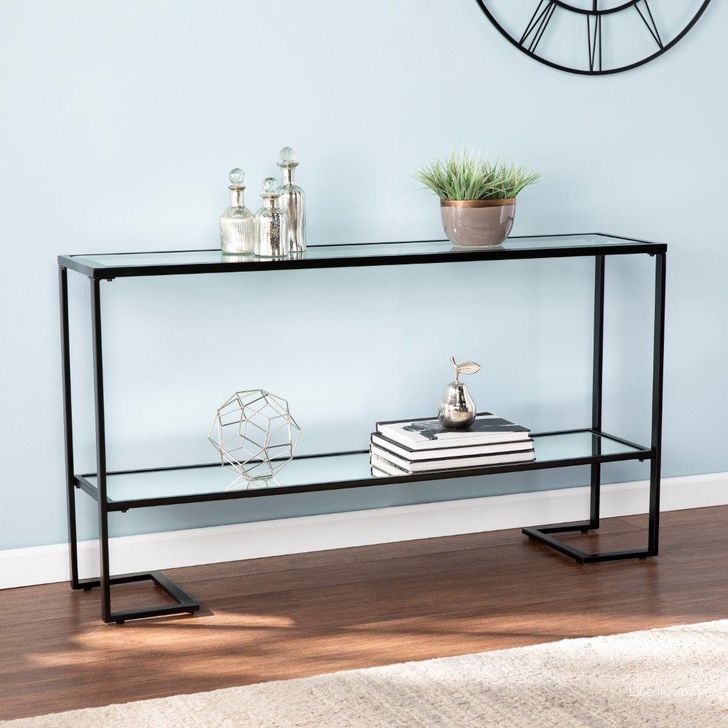 The appearance of Horten Glam Narrow Console Table In Black designed by SEI Furniture in the glam interior design. This black piece of furniture  was selected by 1StopBedrooms from Horten Collection to add a touch of cosiness and style into your home. Sku: CM2659. Material: Glass. Product Type: Console Table. Image1