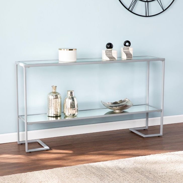 The appearance of Horten Glam Narrow Console Table In Silver designed by SEI Furniture in the glam interior design. This silver piece of furniture  was selected by 1StopBedrooms from Horten Collection to add a touch of cosiness and style into your home. Sku: CM3659. Material: Glass. Product Type: Console Table. Image1