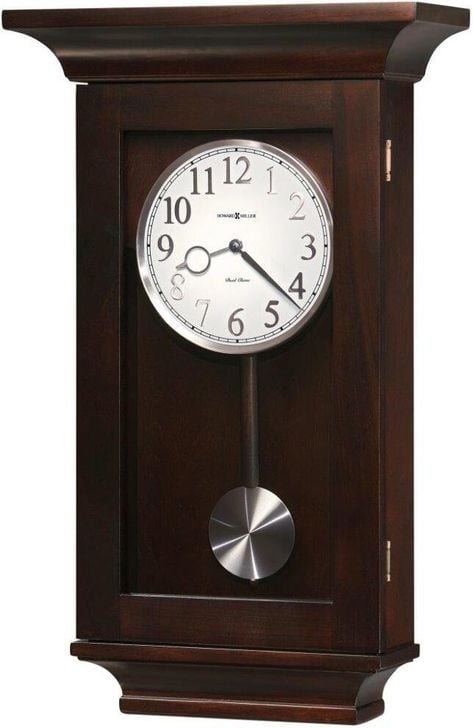 The appearance of Howard Miller Gerrit Wall Clock designed by Howard Miller in the modern / contemporary interior design. This dark brown piece of furniture  was selected by 1StopBedrooms from Gerrit Collection to add a touch of cosiness and style into your home. Sku: 625379. Product Type: Wall Clock. Image1